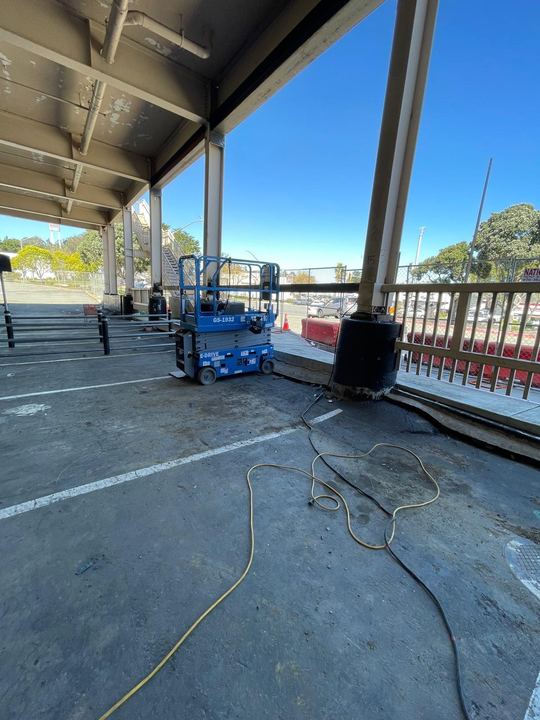 On-site welding for commercial parking, railing, and metal support repairs.