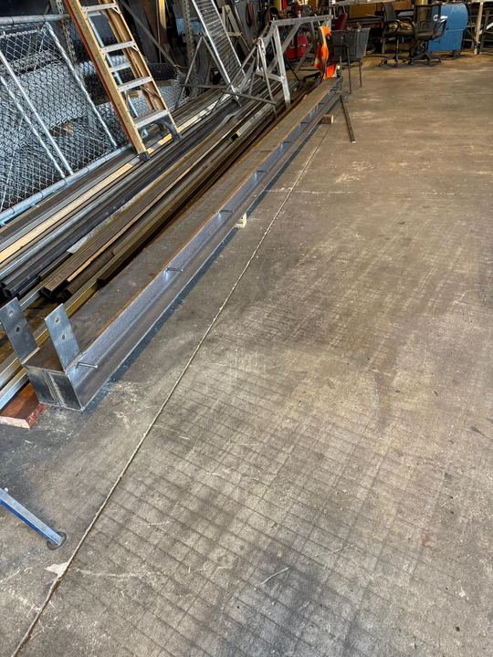 Steel frame layout, fabrication, repair, and fitting in the shop.