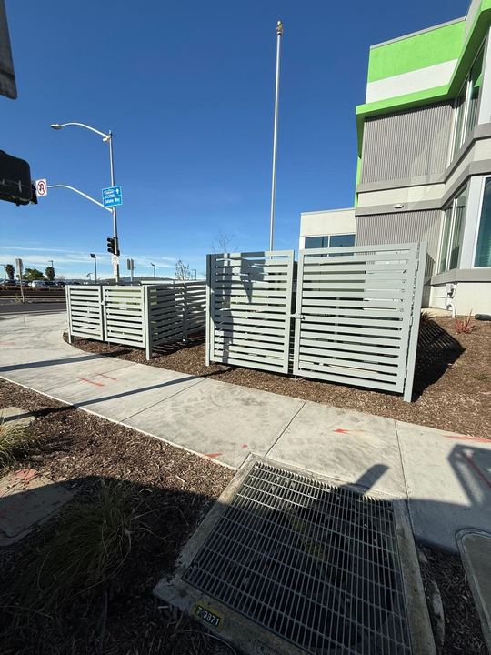Welded steel fence, gate, and commercial security metal fabrication.