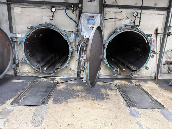 Industrial pipe flange welding, connection prep, and metal fitting.