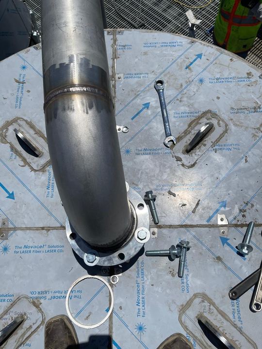 Flanged pipe assembly welding, fitting, and support details.